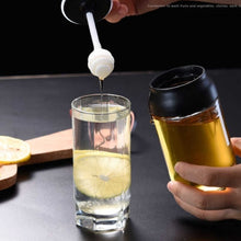 Mielero de Vidrio con Tapa Antiderrame